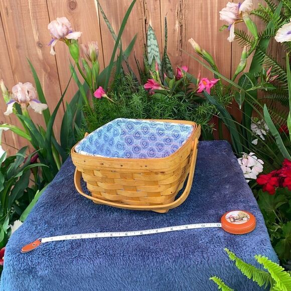 Longaberger basket with cloth and plastic liner and hinged handle - Picture 1 of 9